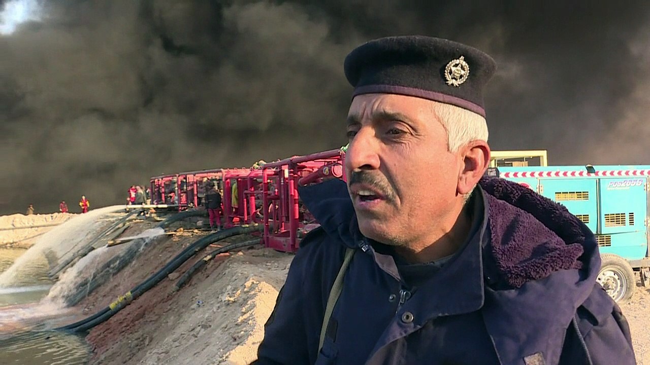 Iraqi firefighters battle to tame IS oil well fires