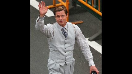 Marion Cotillard and Brad Pitt embrace at the premiere