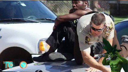 Policial salva homem de perigosos pit bulls.