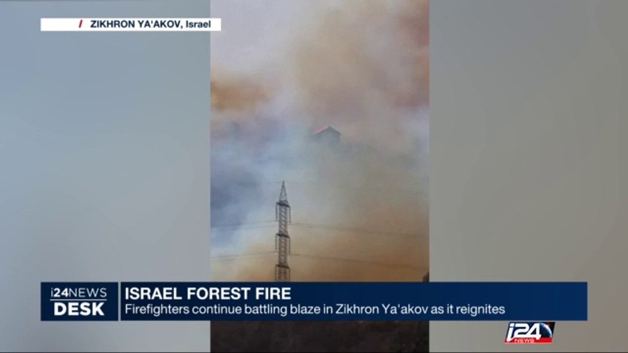 Firefighters continue battling blaze in Zikhron Ya'akov as it reignites