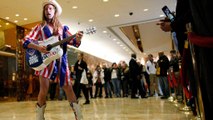 The Naked Cowboy sings 'The Trump Song' at Trump Tower