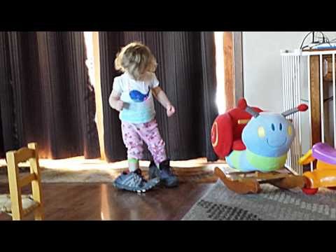 Little Girl Stomps Around in Massive Shoes