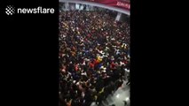 Thousands cram into Chinese Tube station during snow storm