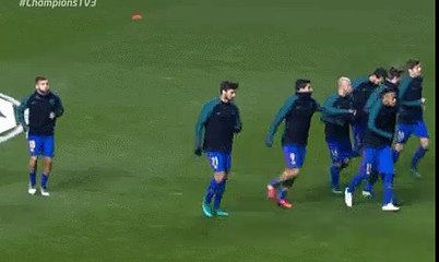 Suarez putting ice cubes onto Neymar's back