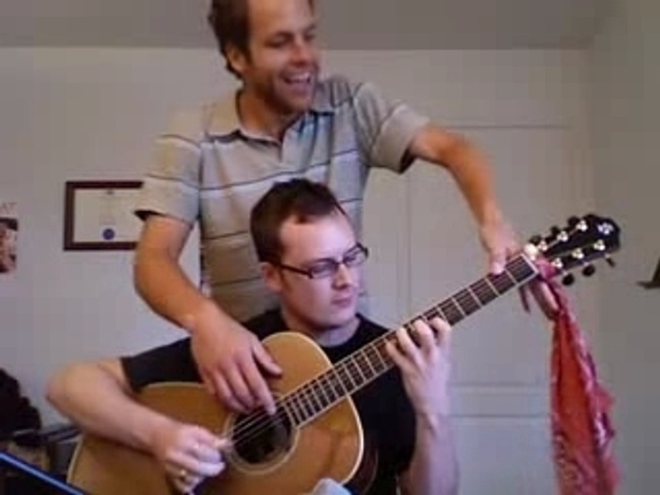Guitare A 4 Mains