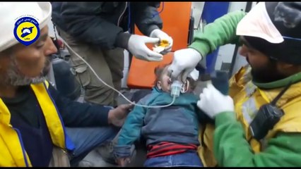 Amateur video shows child rescued from rubble as fighting rages in Aleppo