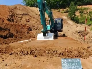 Heckbagger Anlage sanften Druck Eimer