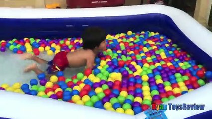 GIANT BALLOONS SURPRISE TOYS and Ball Pit challenge in huge pool Disney toys Ryan ToysReview