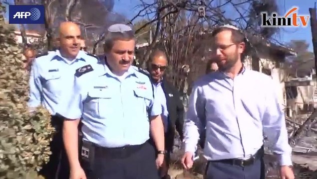 Residents return to bushfire aftermath in north Israel