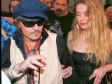 Amber Heard delivers  an emotional PSA on  domestic abuse  following her break up  with Johnny Depp