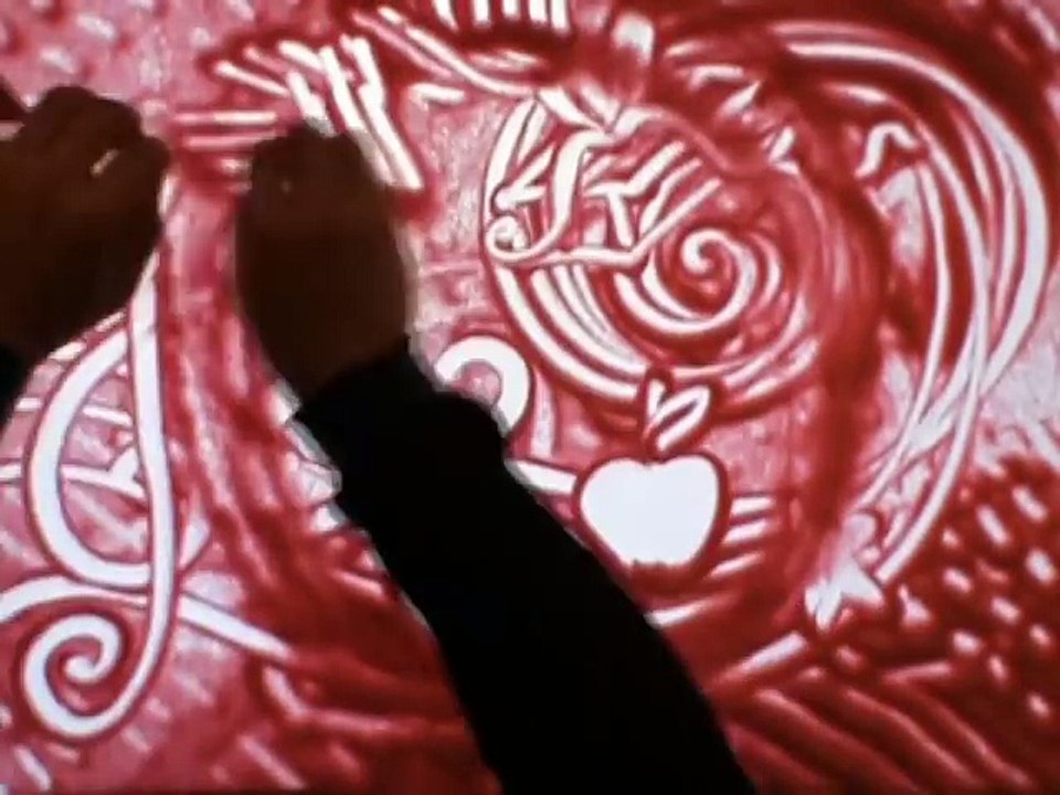 sand drawing Merry Christmas