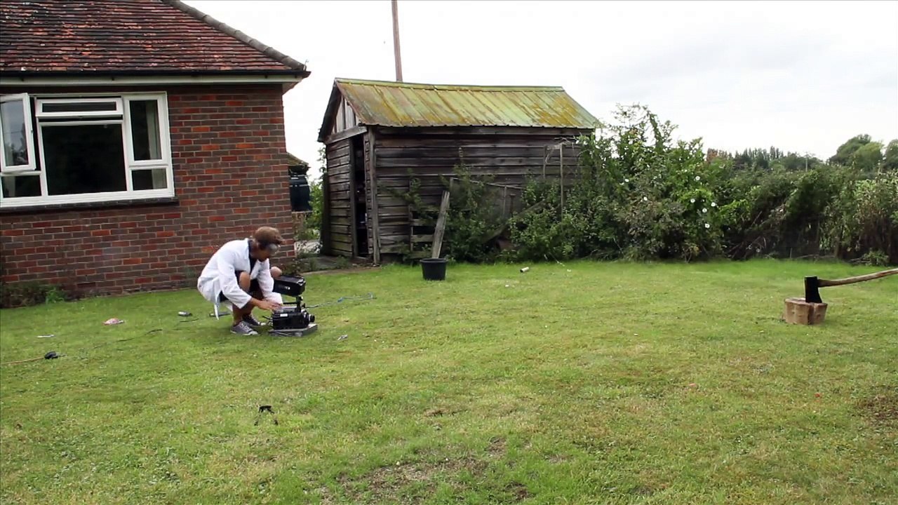 Axe Through a Deodorant Can - The Slow Mo Guys
