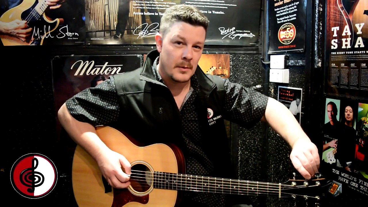 How to tune a guitar with a chromatic tuner