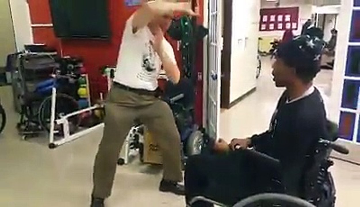 Rabbi Sensei gary moskowitz training and giving Martial Arts Therapy to wheelchair bound man