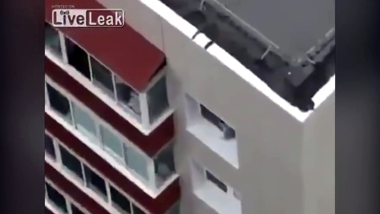 Baby walks along ledge of high rise window in India!