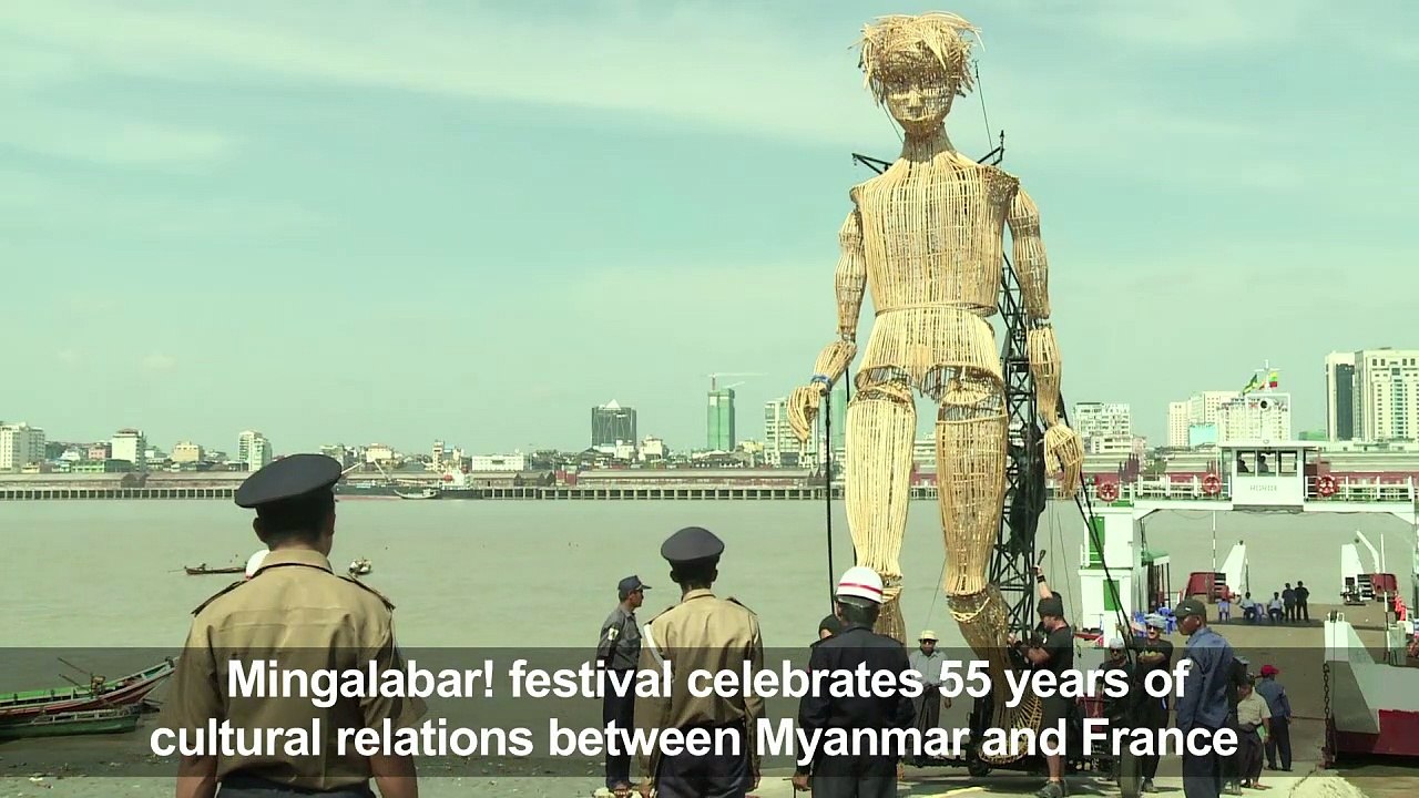 Giant puppet parades in Myanmar's Yangon region