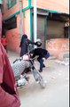 Girl Beating Boy With Helmet For Teasing Her