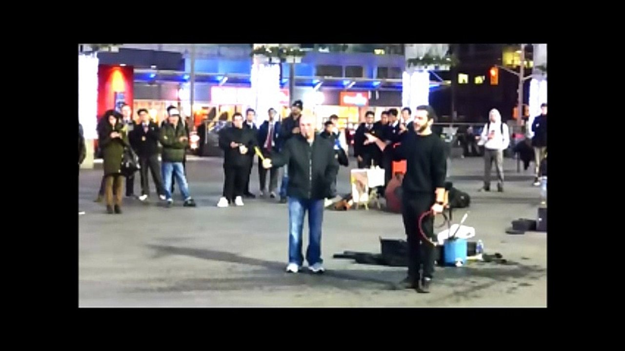 Busking at Yonge and Dundas Square.