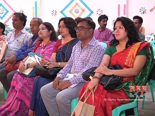 ঘাসফুলের পক্ষ থেকে কবি আসাদ চৌধুরিকে সম্মাননা