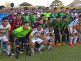 San Lorenzo walk out in Chapecoense shirts
