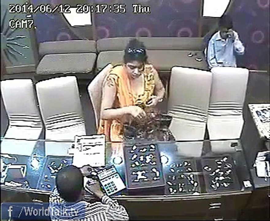 Female thief caught on CCTV camera stealing jewellery