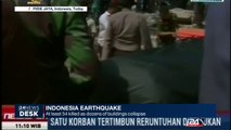 Indonesia earthquake : at least 54 killed as dozens of building collapse