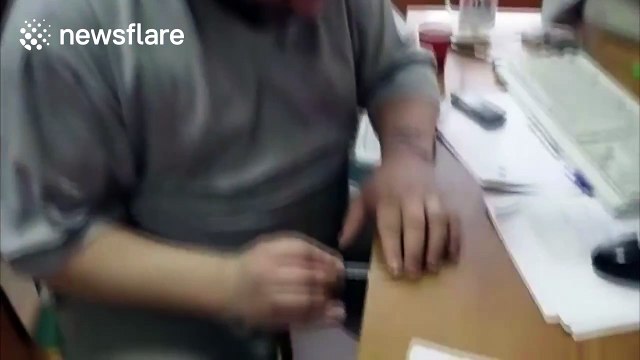 Man plays Star Wars 'Imperial March' with a coffee stirrer