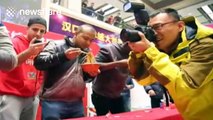 Woman finishes bowl in eight seconds in noodle eating competition