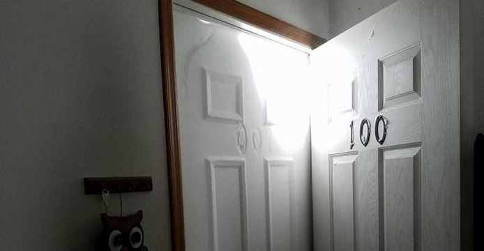 Door Leaves Imprint on Snow as Blizzard Engulfs North Dakota Home