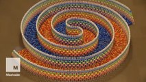 This triple spiral of 15,000 dominoes falling down is incredibly satisfying to watch