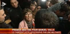 Valls pris à partie par une militante après son meeting