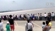 Des spectateurs chinois viennent assister aux mascarets