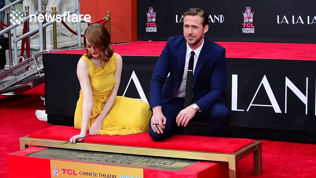 Emma Stone and Ryan Gosling cast hand and foot prints at TCL Chinese Theatre