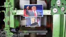 Donald Trump esmaga Hillary Clinton com uma prensa hidráulica