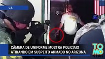 Câmera de uniforme mostra policiais aitrando em suspeito armado.