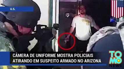 Câmera de uniforme mostra policiais aitrando em suspeito armado.