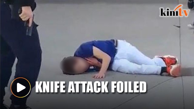 US Student brandishes blade, gets shot by police officer