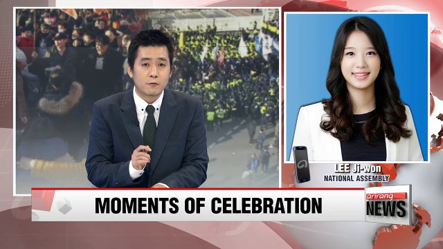 People gather outside National Assembly to celebrate