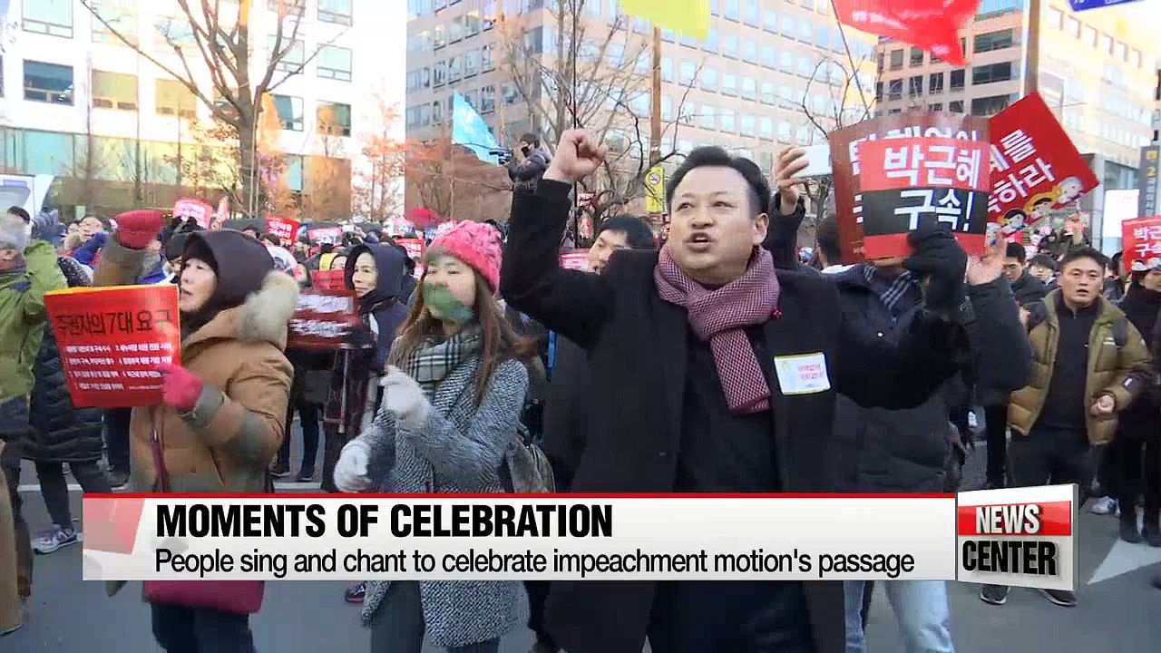 People gather outside the National Assembly to celebrate impeachment motion's passage