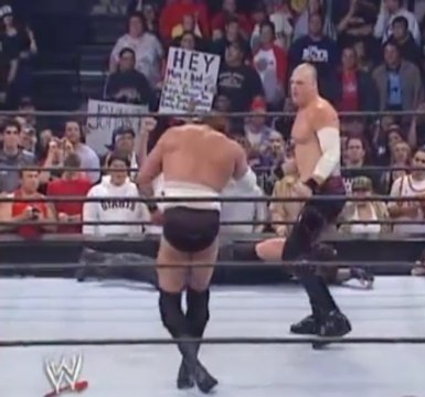 Kane saves The Undertaker from Snitsky and Heidenreich