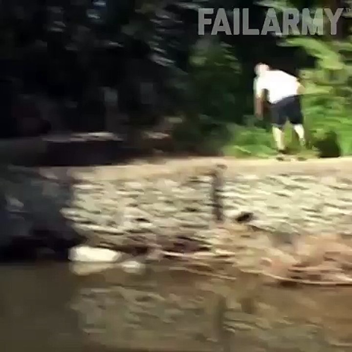 funny boy fall in water