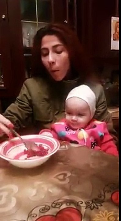 Mother ignores child while eating pomegranate-funny videos