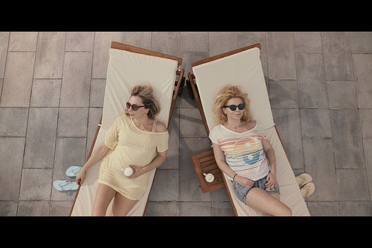 Two women in their forties, looking for happiness