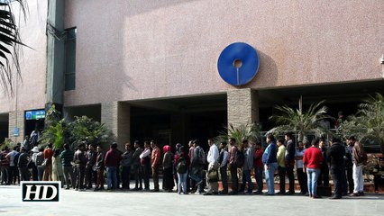 Long queues at banks ATMs after long weekend