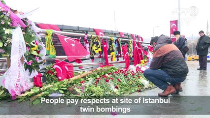 People pay respects at site of Istanbul twin bombings