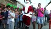 Santa Claus brings holiday joy to Caracas shantytown