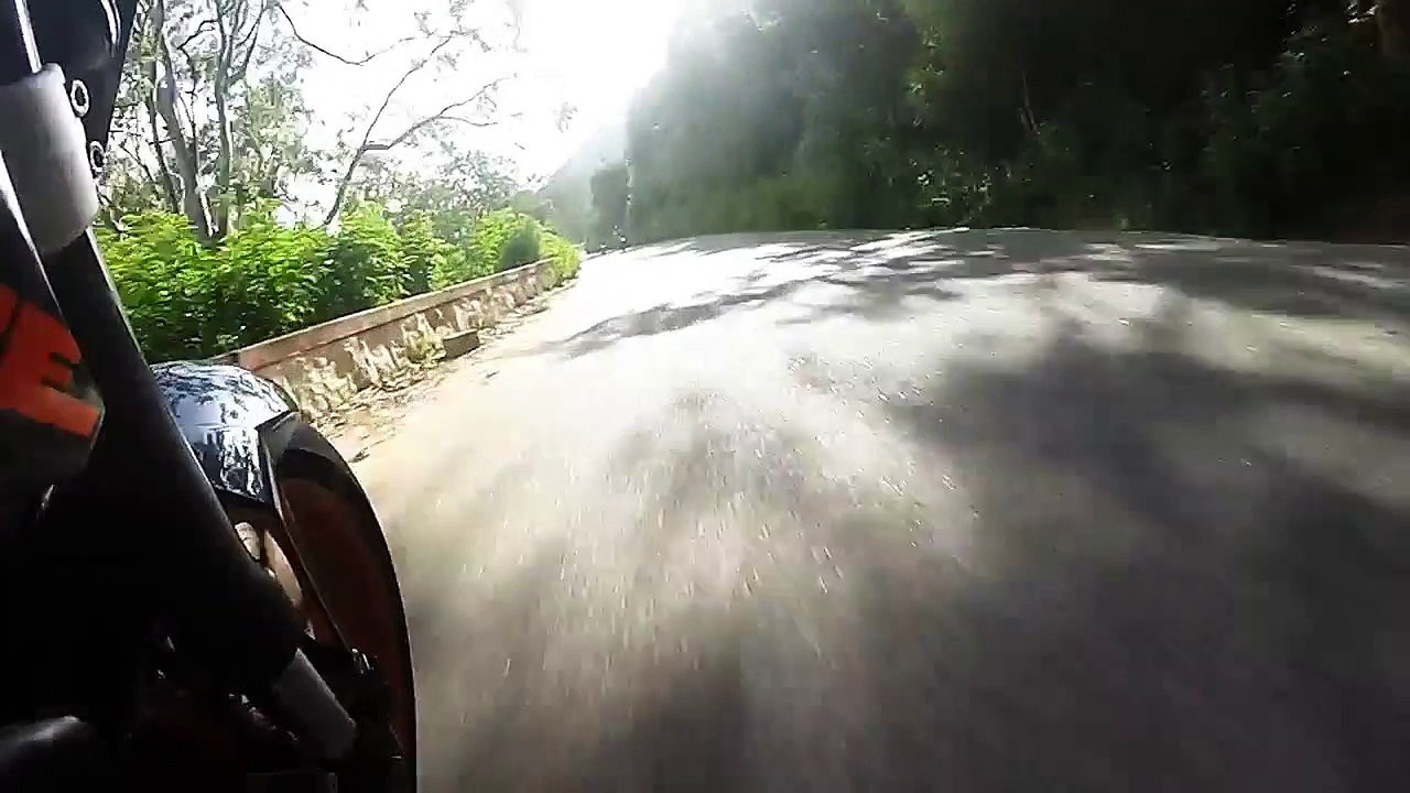 Motorcyclist Narrowly Avoids Head on Collision
