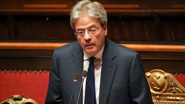 Italy's new prime minister wins confidence vote staving off political turmoil