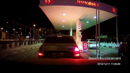 Car Catches Fire at Gas Station