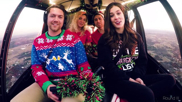Singing Christmas carols from a helicopter